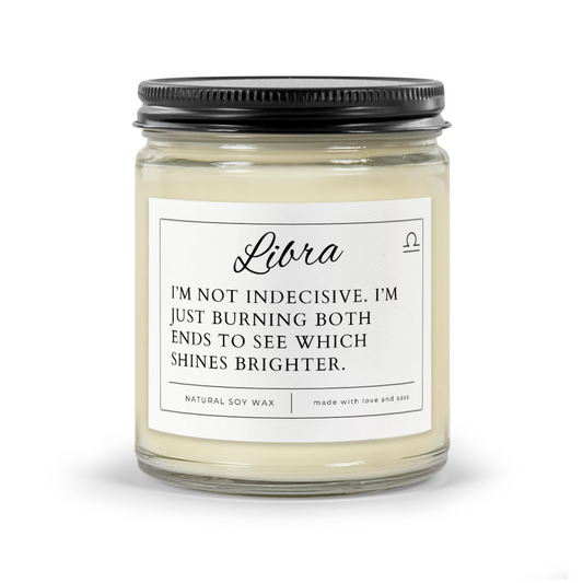 Candle Thumbnail - Libra Funny Zodiac Candle. White wax in clear 9oz jar with black matte lid. Label reads "LIbra - I'm not indecisive. I'm just burning both ends to see which shines brighter."